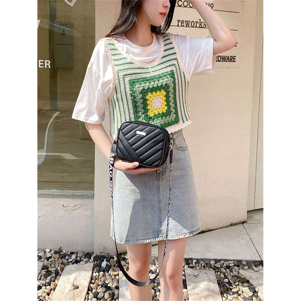 Rolg strip camera 2024ladies Crossbody women's new storage shoulder mobile phone bag