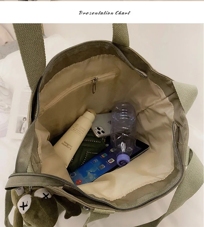 Womens shopping bag simple and fashionable zipper handbag shoulder waterproof large capacity handbag womens 241111