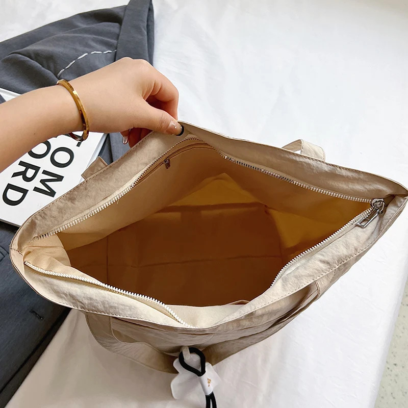 Summer large capacity canvas womens bag fashionable casual shoulder bag Versatile commuting handbag 241111