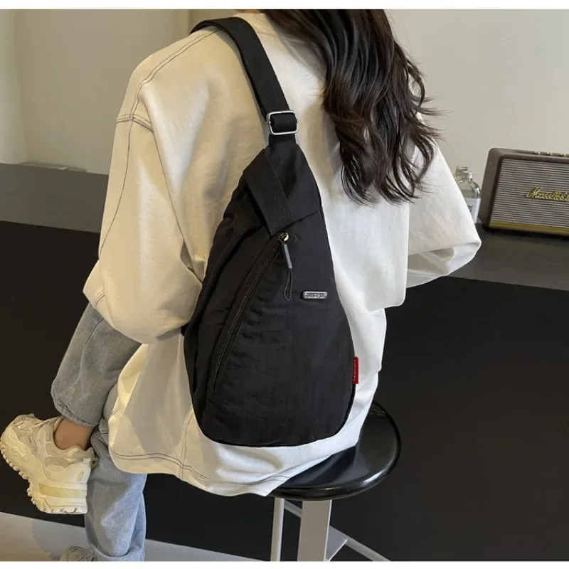 Breast bag Korean canvas Japanese mens shoulder messenger bag handbag wallet 241111