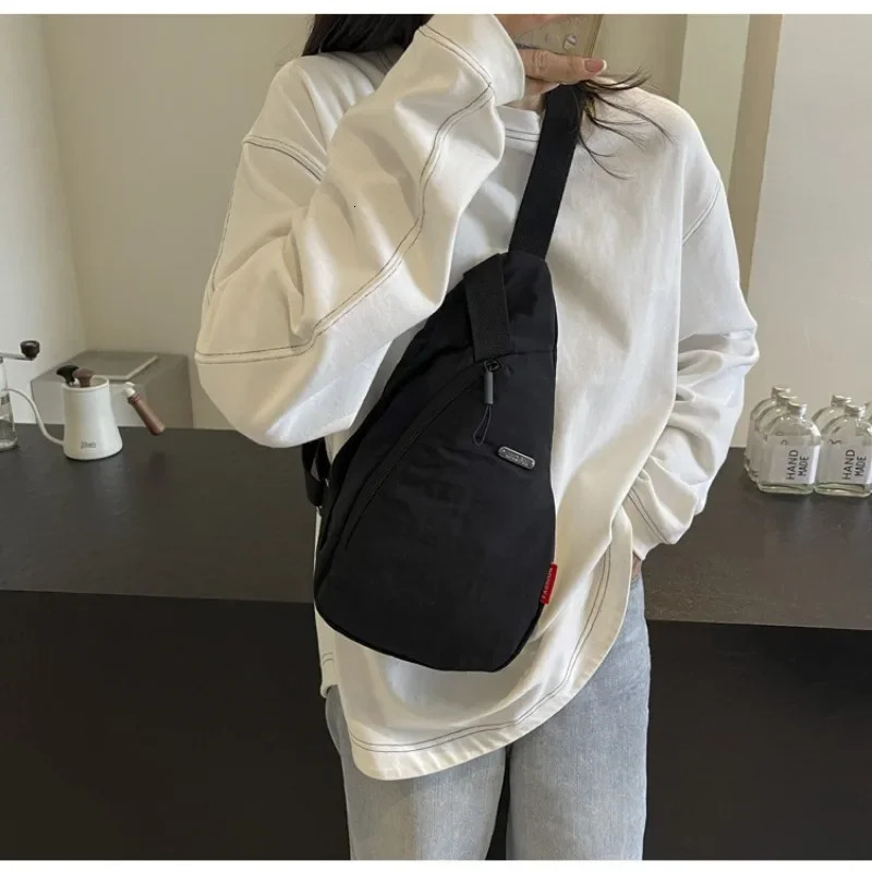 Breast bag Korean canvas Japanese mens shoulder messenger bag handbag wallet 241111