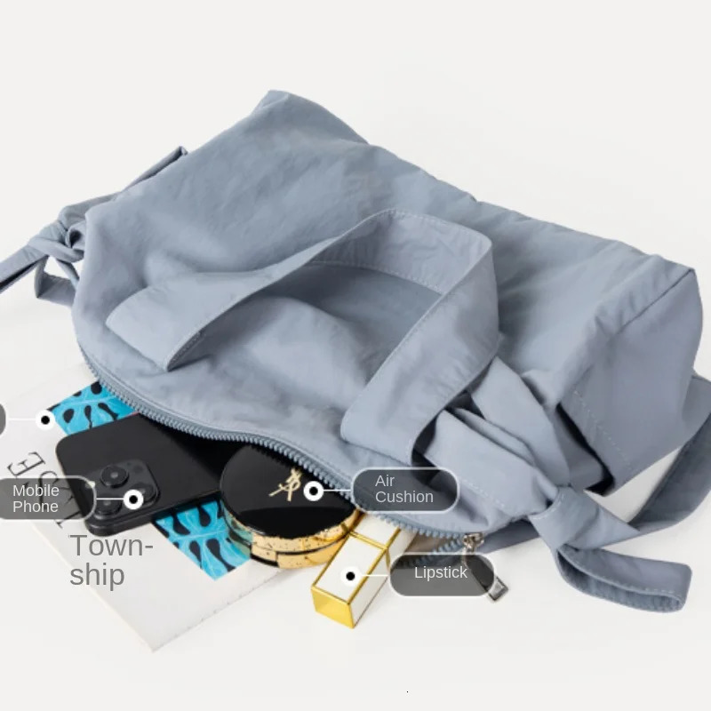 Niche high-end handbag fashionable bow shoulder bag lightweight and large capacity travel bag 241111