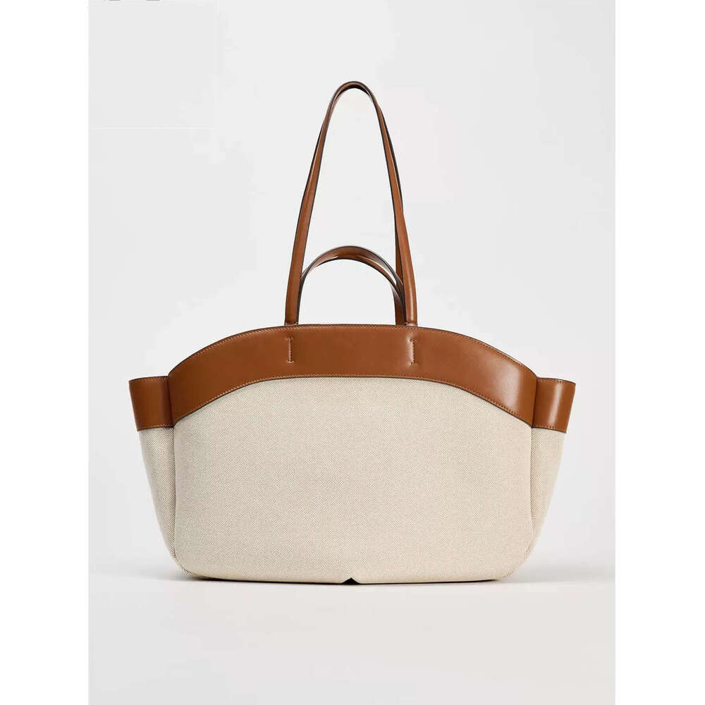 Canvas Women 2024 new fashion splicing large capacity commuter shopping hand bill shoulder tote bag