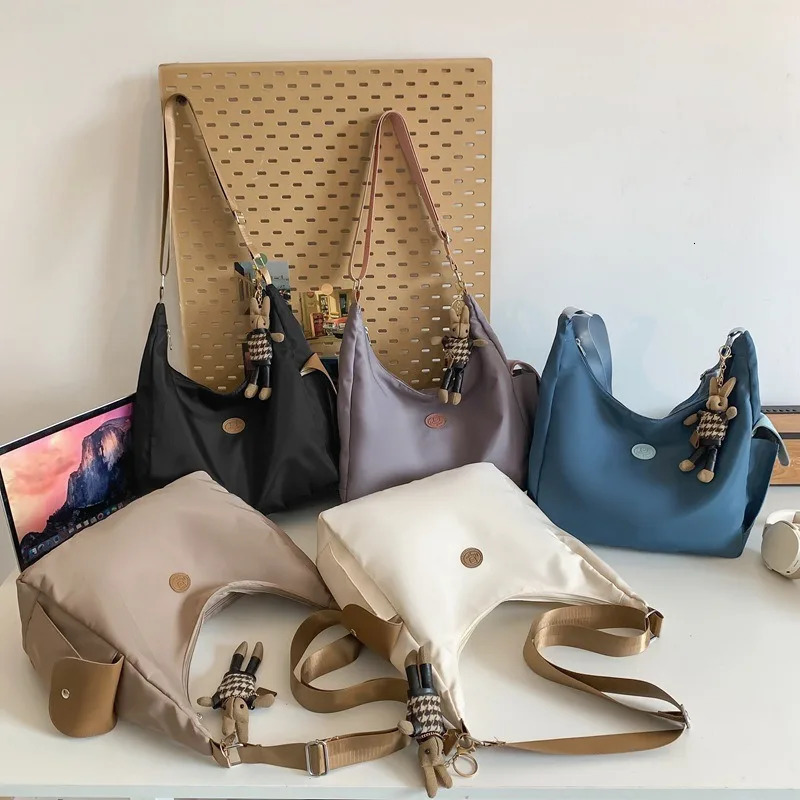 Canvas womens shoulder crossed backpack waterproof and fashionable student messenger bag school handbag 241111