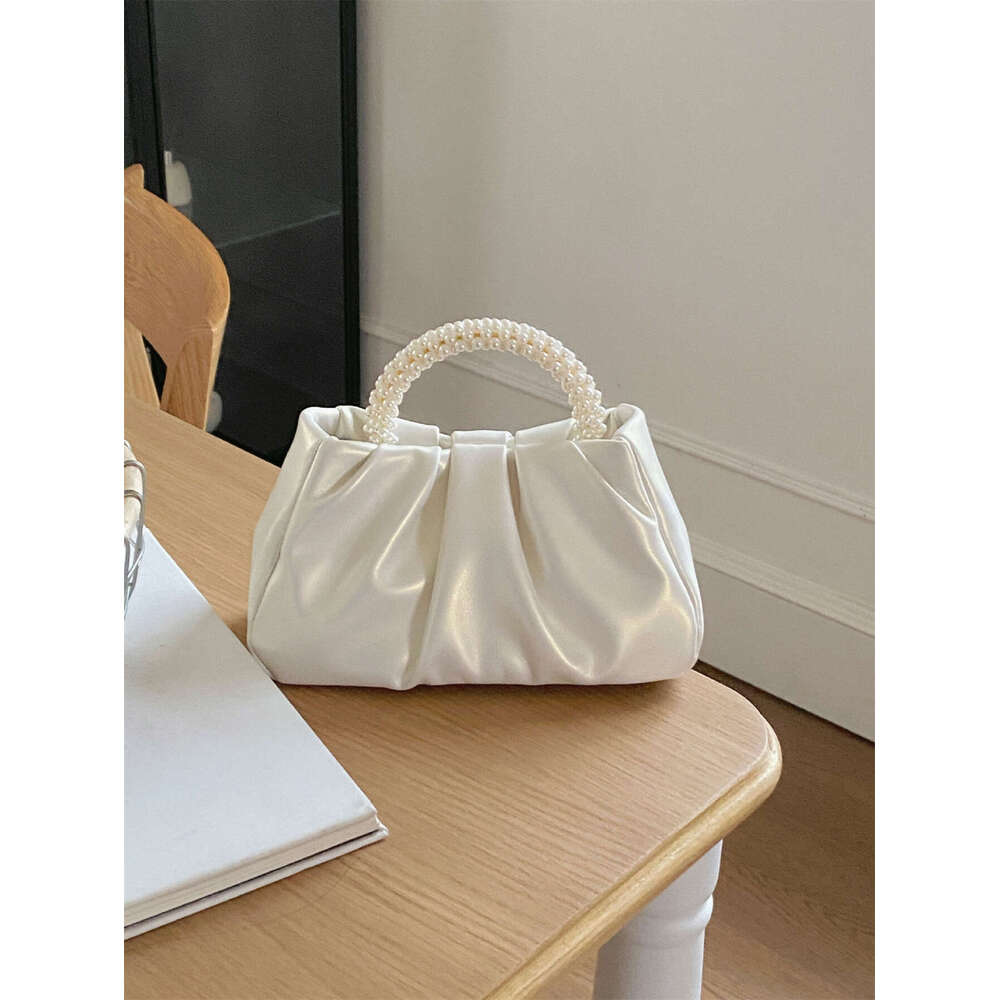 French pleated 2024 Advanced sense fairy Pearl small handbag Gentle wind crossbody cloud bag female