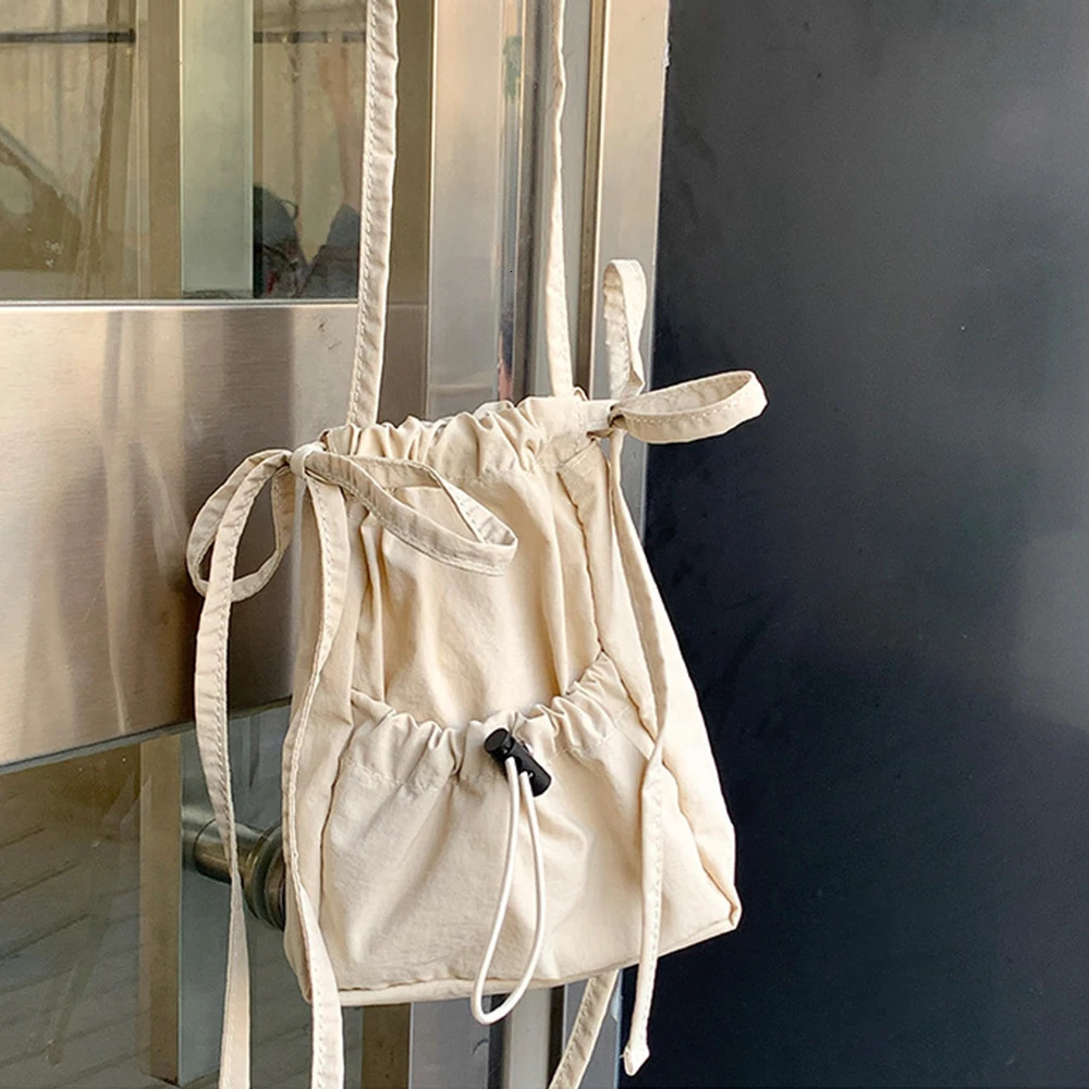 Mini drawstring cross body bag for womens casual Ruched shoulder bag small canvas phone flip bag square nylon handbag fashion 241111