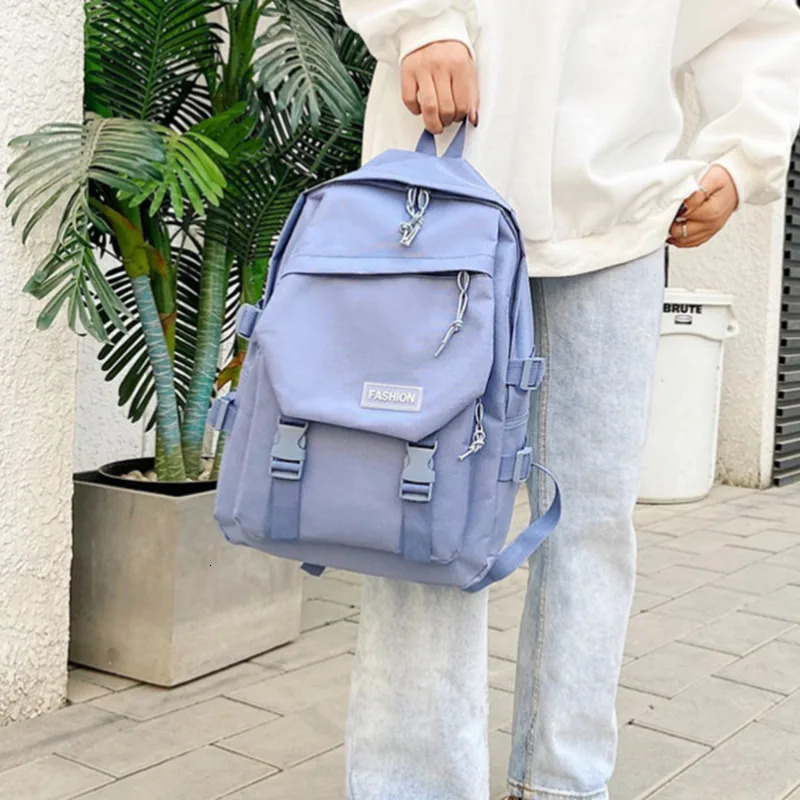 Simple backpack large capacity travel bag solid Harajuku student backpack womens backpack unisex version 241111