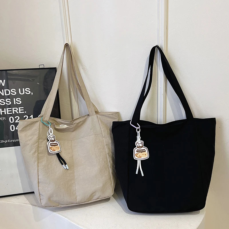 Summer large capacity canvas womens bag fashionable casual shoulder bag Versatile commuting handbag 241111