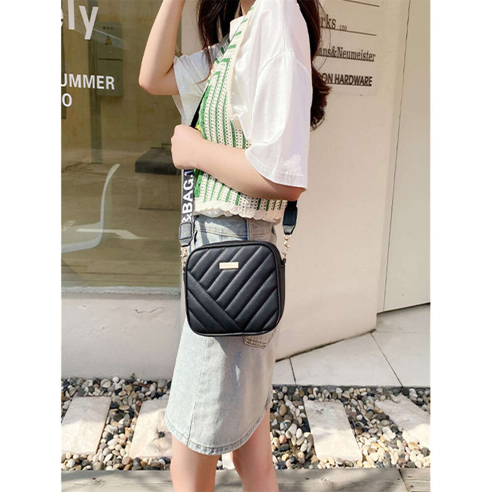 Rolg strip camera 2024ladies Crossbody women's new storage shoulder mobile phone bag