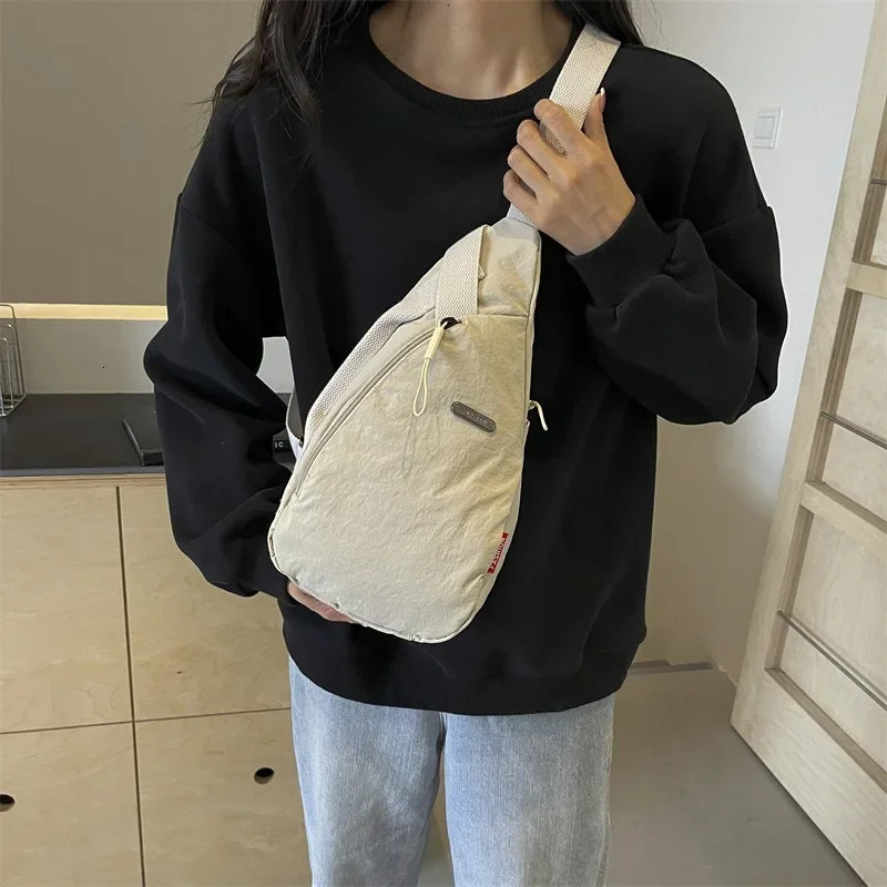 Breast bag Korean canvas Japanese mens shoulder messenger bag handbag wallet 241111