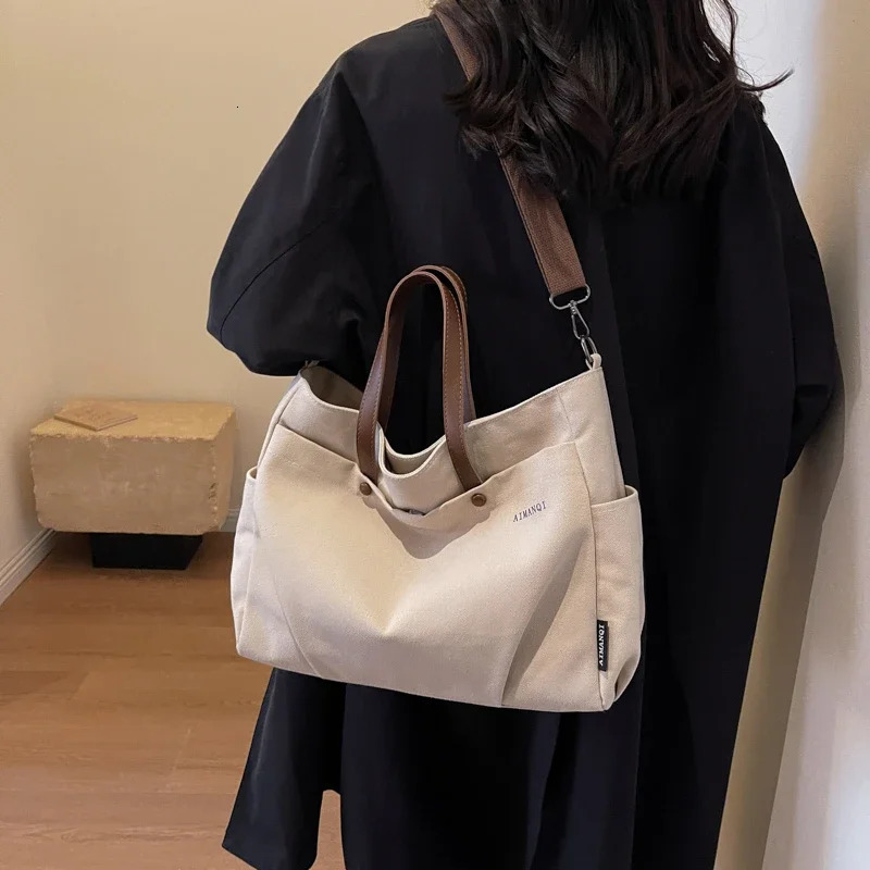 Solid color casual canvas womens cross body bag fashionable simple large capacity zipper multifunctional handbag 241111