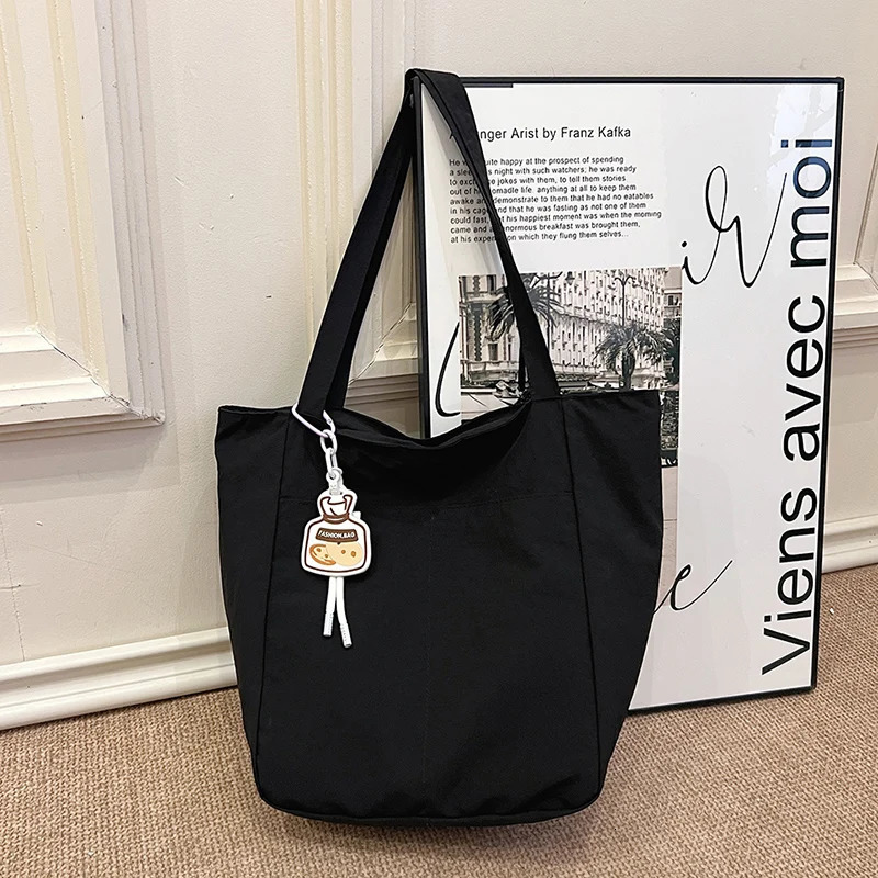 Summer large capacity canvas womens bag fashionable casual shoulder bag Versatile commuting handbag 241111