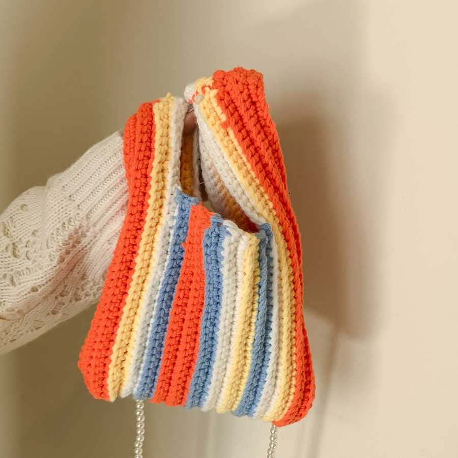 This year's popular large capacity striped contrasting shoulder bag for women, 2024 autumn and winter new yarn knitted hand-held bucket bag