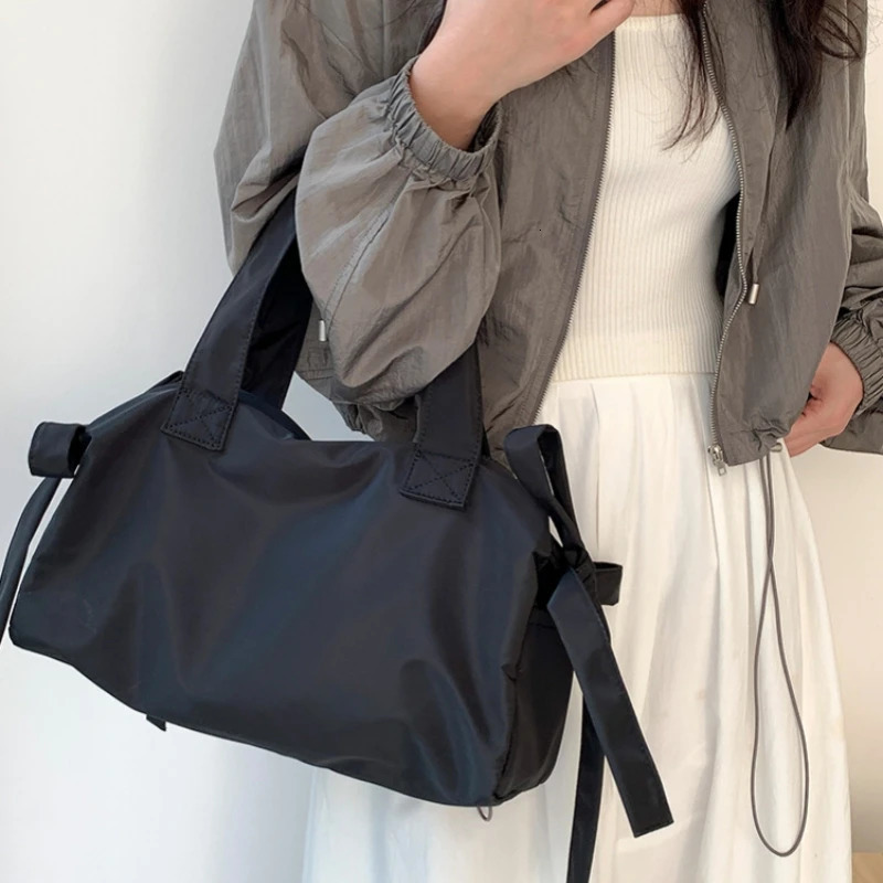 Niche high-end handbag fashionable bow shoulder bag lightweight and large capacity travel bag 241111