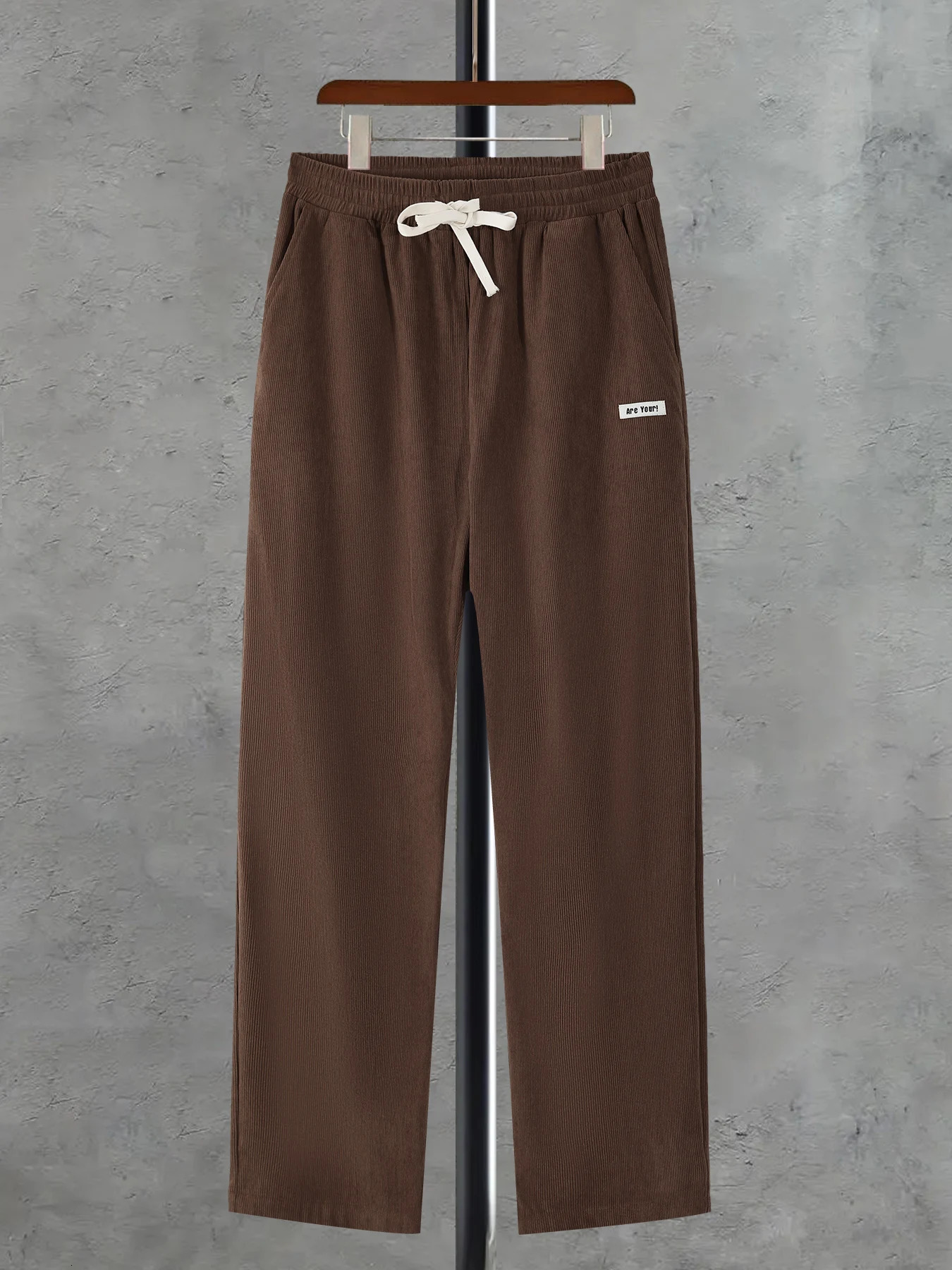 Mens Casual Regular Fit Full Length Drawstring Corduroy Pants Long Trouser with Character Cloth Label For Fall and Spring 241112