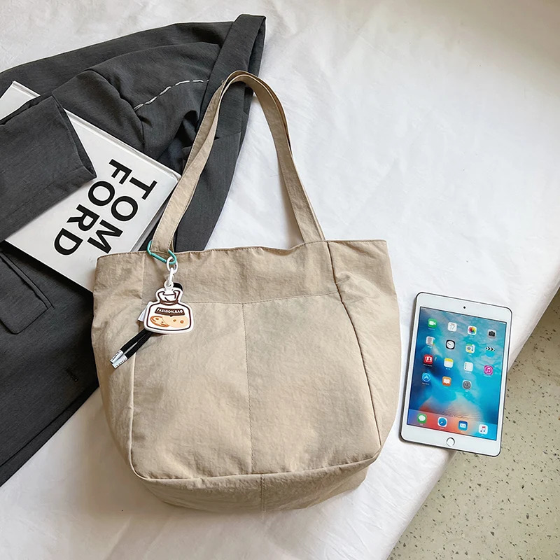 Summer large capacity canvas womens bag fashionable casual shoulder bag Versatile commuting handbag 241111