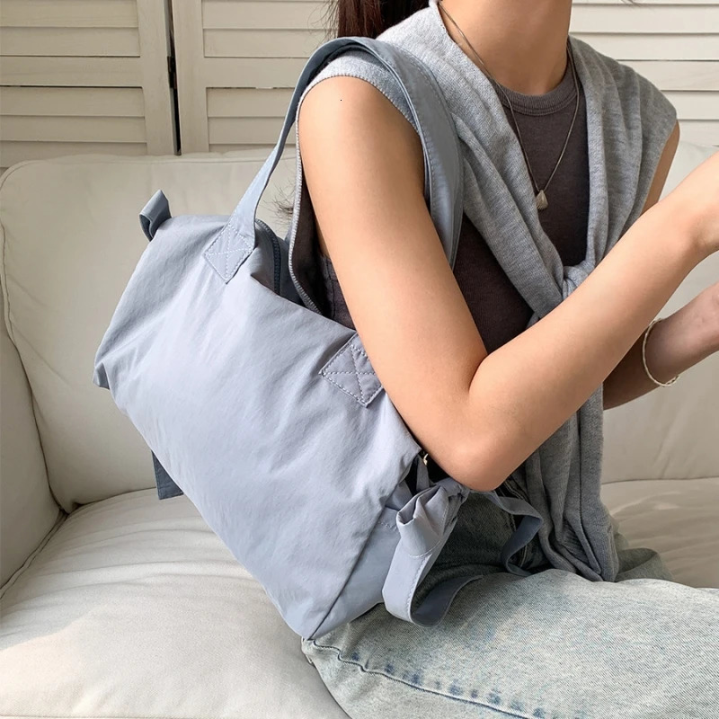 Niche high-end handbag fashionable bow shoulder bag lightweight and large capacity travel bag 241111