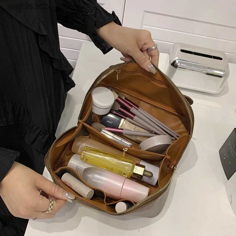 Cosmetic Bags 2023 Outdoor Makeup Bag Handheld Large-capacity Women Cosmetic Bag Fashion Leather Advanced Portable Travel Cosmetics Case L49