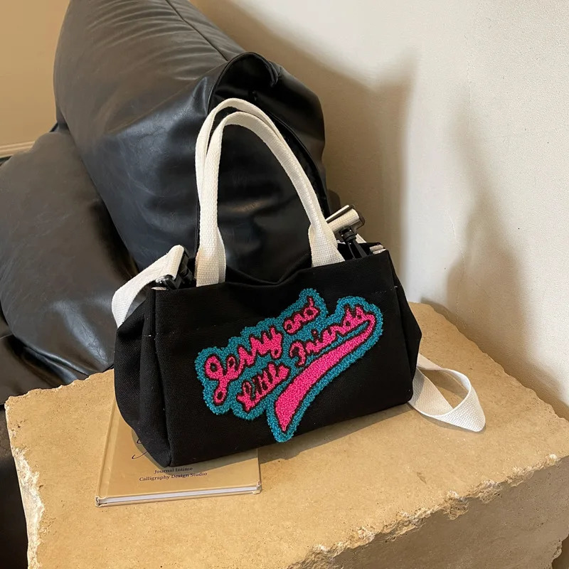 Letters hit color canvas bag pillow womens bag trend fashion shoulder wide shoulder strap cross bag 241111