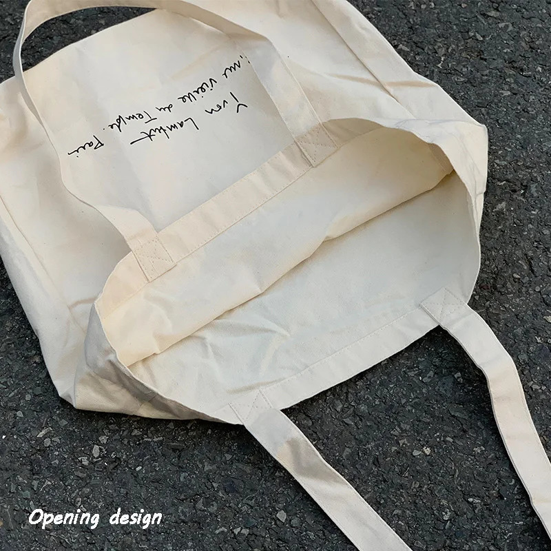 Womens canvas bag womens casual large capacity letter printing handbag womens shoulder bag reusable shopping bag 241111