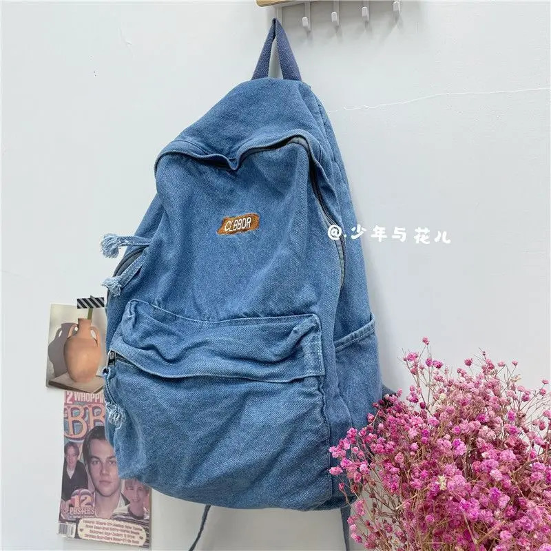 Lazy style washing jeans backpack in Japan simple clown student bag Harajuku style high school backpack 241111