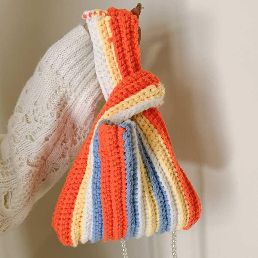 This year's popular large capacity striped contrasting shoulder bag for women, 2024 autumn and winter new yarn knitted hand-held bucket bag