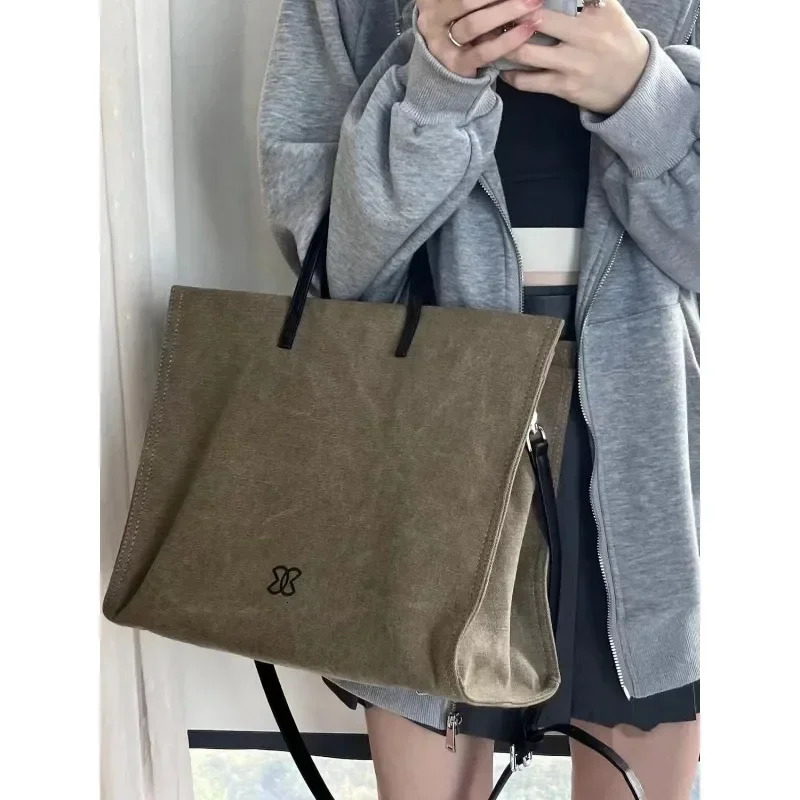 Korean style canvas handbag INS style cross body bag large capacity suitable for work and business wallet 241111