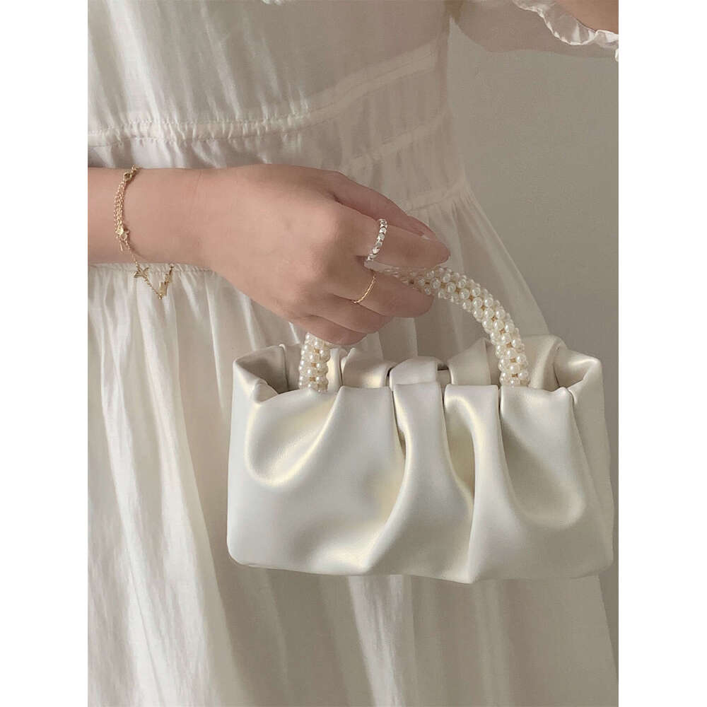 French pleated 2024 Advanced sense fairy Pearl small handbag Gentle wind crossbody cloud bag female