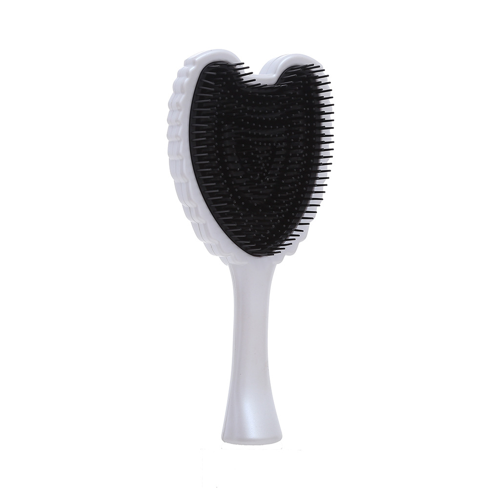 Chic Angel Wing Hair Brush Sleek and Convenient Combing Tool for Everyday Care