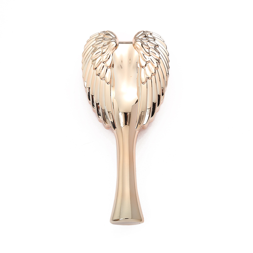 Trendy Minimalistic Hair Brush Featuring Angel Wings - Elegant Solid Colored Combing Tool for Ladies