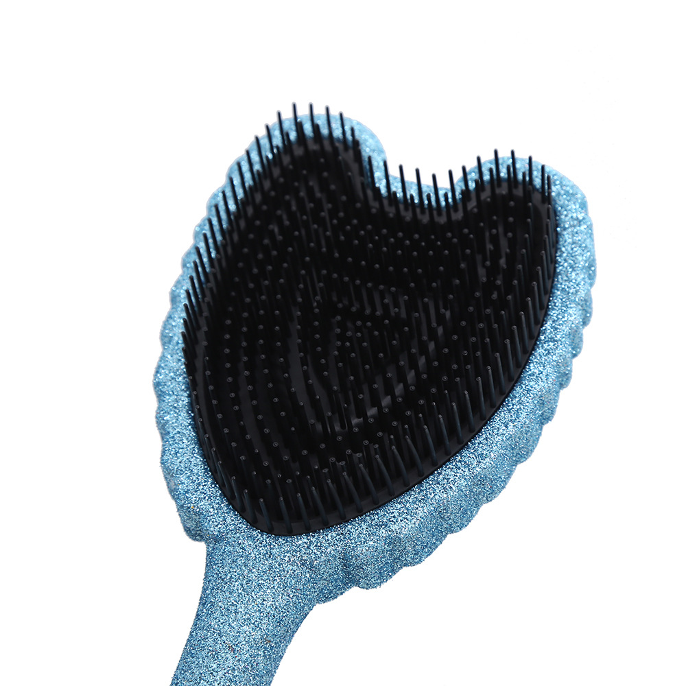 Portable Angel Wing Hair Comb Chic and Functional Handheld Grooming Device