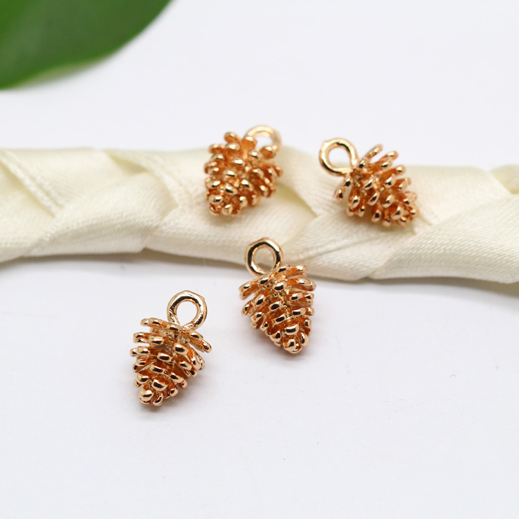 Elegant Bronze Pinecone Pendant with Authentic Gold Electroplating Gold in packs of 100