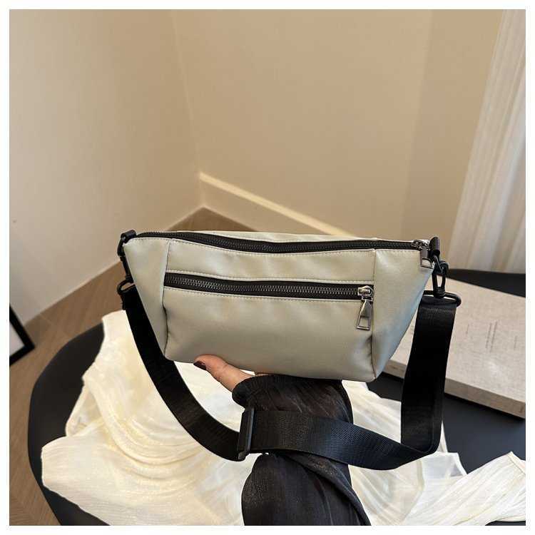 Spring new casual crossbody small bag, women's fashion zipper digging bag decoration, solid color nylon lightweight outdoor sports bag