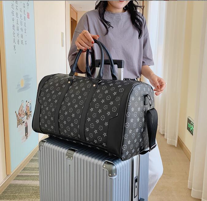 Designers fashion duffel bags luxury men female travel bags pu leather handbags large capacity holdall carry on luggage overnight weekender bag