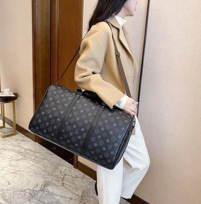 Quality Men Duffle l Bag Women Hand Luggage Travel Bags Men keepall Pu Leather Handbags Large CrossBody Bags Totes 55cm