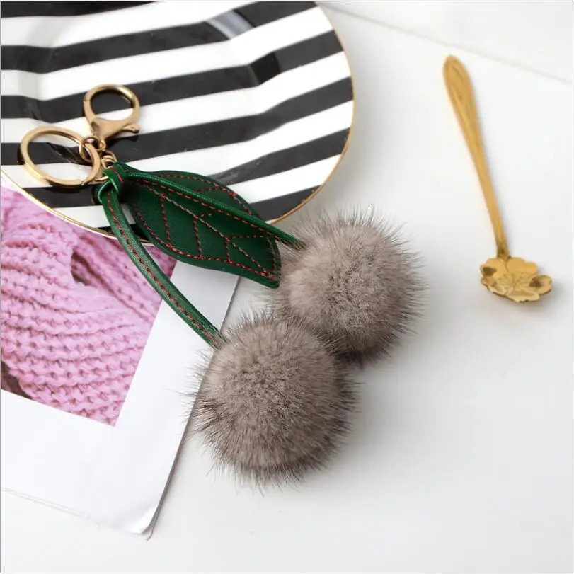 Genuine leather mink keychain fruit cherry puffball fur bag charming fluffy green leaf backpack pendant accessories 241115