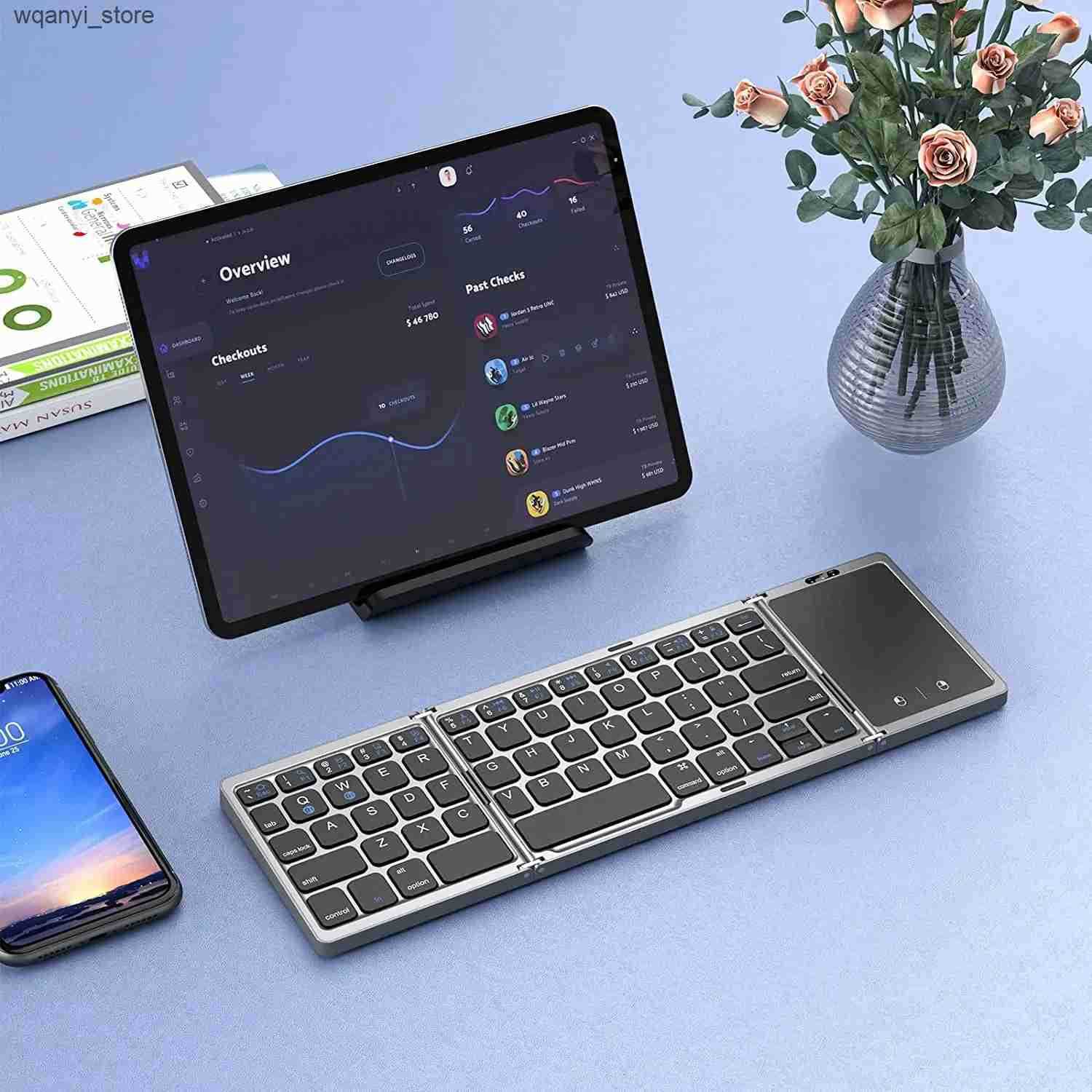 Keyboards 3-Folding keyboard Mini wireless keyboard Foldable dual Bluetooth keyboard with touchpad suitable for Windows Android iOS iPad phones L24091