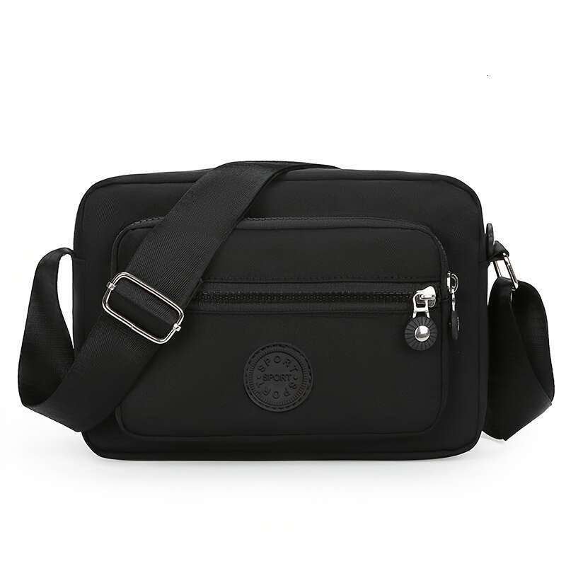 Chic Lightweight Nylon Crossbody Bag for Women - Adjustable Strap, Solid Color with Tassel Accent, Zip Closure