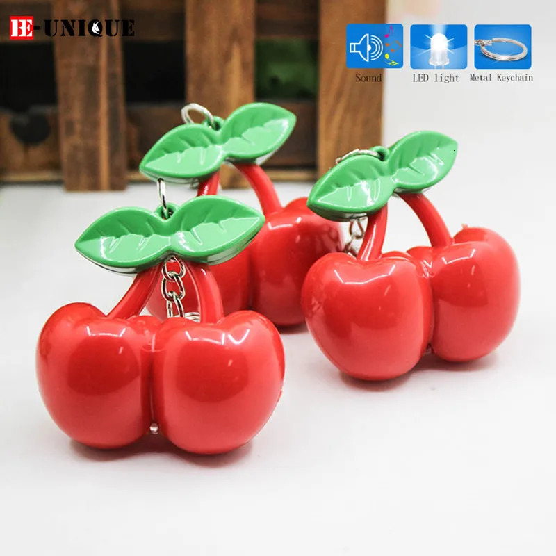 12 Joue Cherry LED Keychain Childrens Sound Toys Cérese Fruit Keychain Mini Lampe de poche Bag Fomens Pendant Sweet Gift 241115