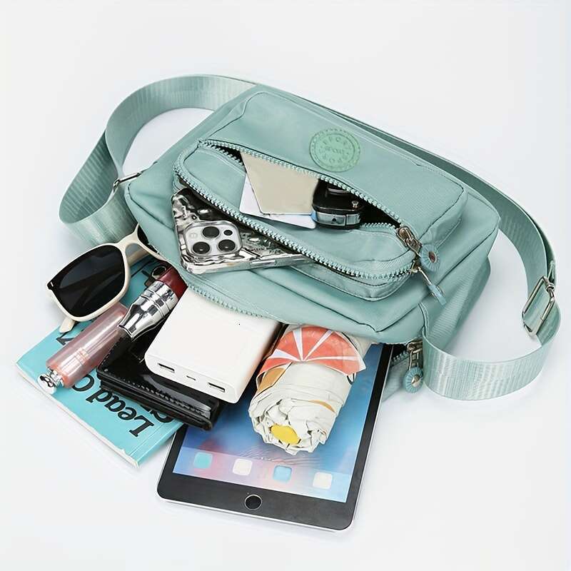 Chic Lightweight Nylon Crossbody Bag for Women - Adjustable Strap, Solid Color with Tassel Accent, Zip Closure