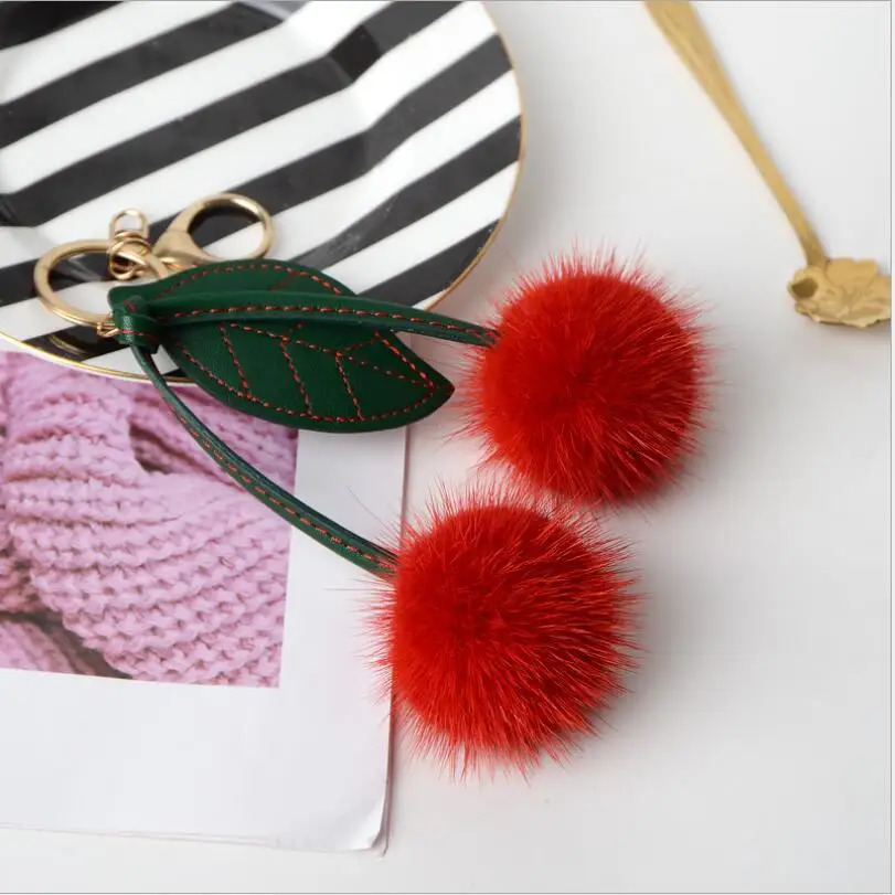 Genuine leather mink keychain fruit cherry puffball fur bag charming fluffy green leaf backpack pendant accessories 241115