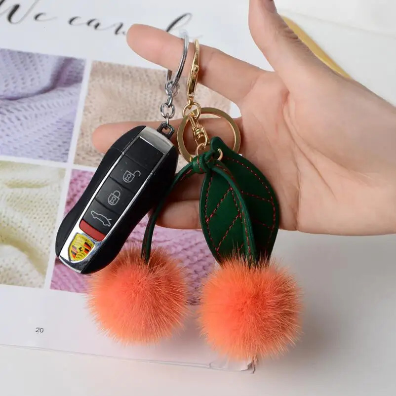 Genuine leather mink keychain fruit cherry puffball fur bag charming fluffy green leaf backpack pendant accessories 241115