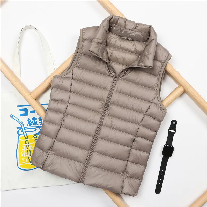 Fashion autumn stand up collar duck down vest for women elegant solid simple zipper jacket casual warm vest for women white duck down vest 241111
