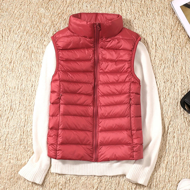 Fashion autumn stand up collar duck down vest for women elegant solid simple zipper jacket casual warm vest for women white duck down vest 241111