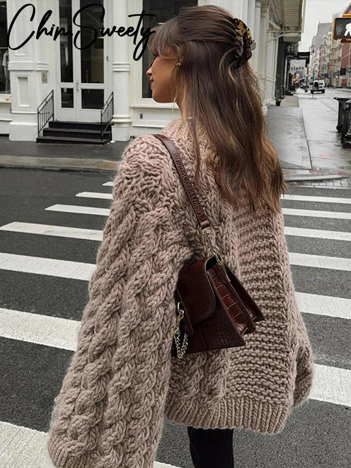 Extra large high neck knitted pullout womens lazy round neck twisted solid womens sweater autumn and winter warm womens sweater 241115