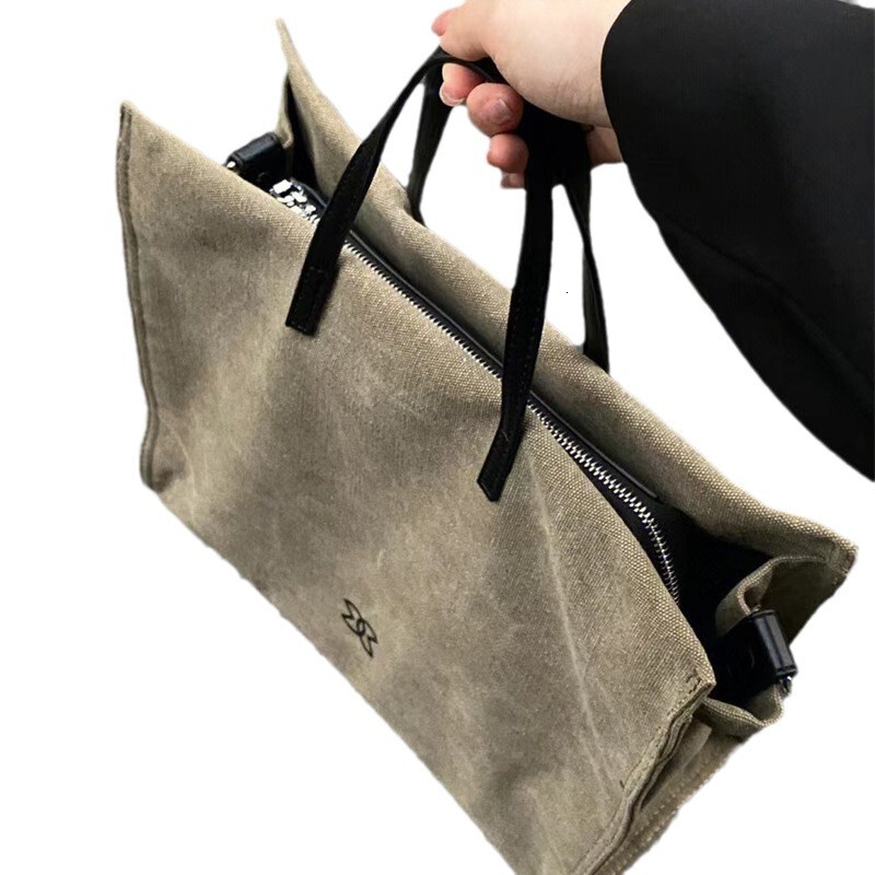 Square canvas tote female designer's new one shoulder crossbody bag, versatile and large capacity commuting handbag