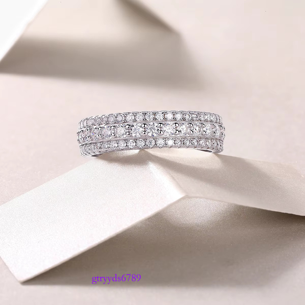 urious 3-Row Moissanite Eternity Ring: Prong & Pave Set in Sterg Sier Flat Court Band