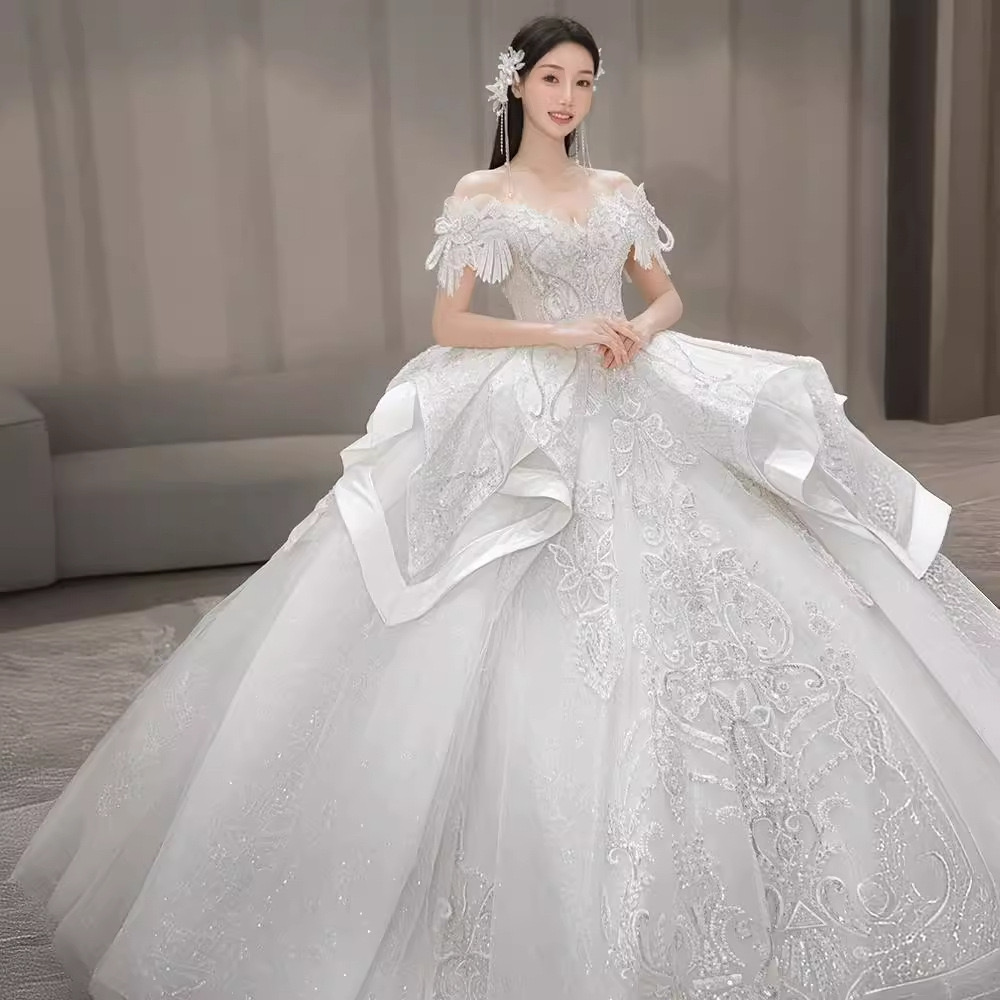 Bohemian 2024 Off The Shoulder Wedding Dresses crystals Sexy Backless Lace Appliqued A Line Beach Boho Bride Dress Plus Size Arabic Beading Bridal Gow