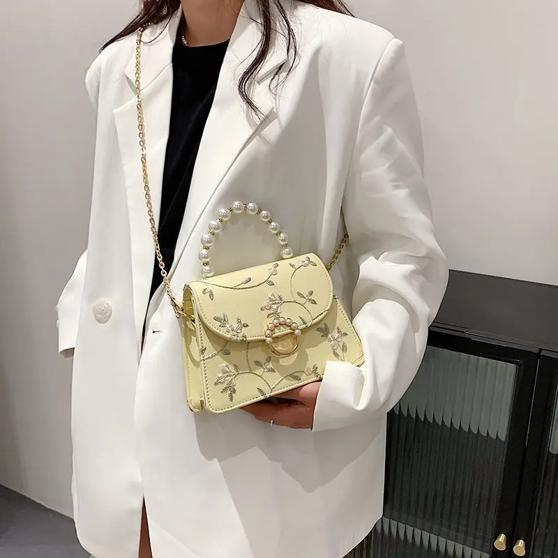2025S New Free Shipping Designer Bag Shell Bead Fashion Sweet Clutch Handbag Lace Wedding Chain Womens Shoulder Cross Bag Wallet