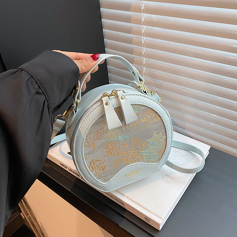 New high end Chinese style crossbody bag with trend multiple functions suitable for commuting Handheld designer small round leisure bag shoulder bag c